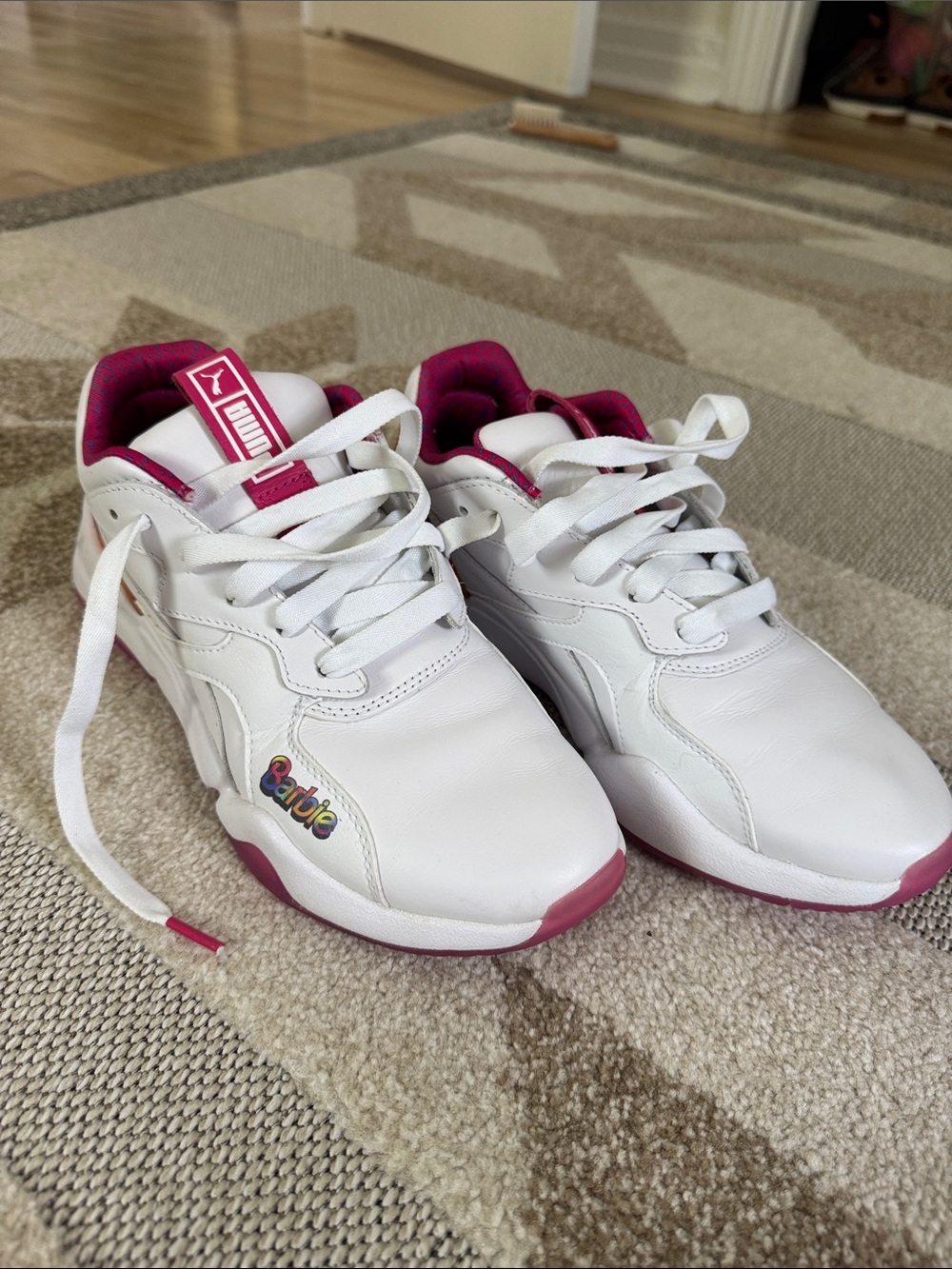 Puma Kids White Sneakers with Pink Accents